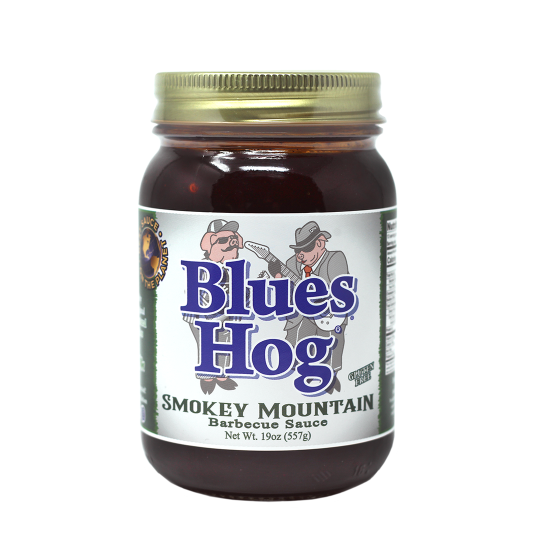 The front of a pint jar of Blues Hog Smokey Mountain Barbecue Sauce