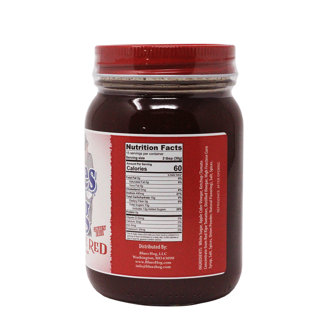The left side of a pint jar of Blues Hog Tennessee Red Barbecue Sauce